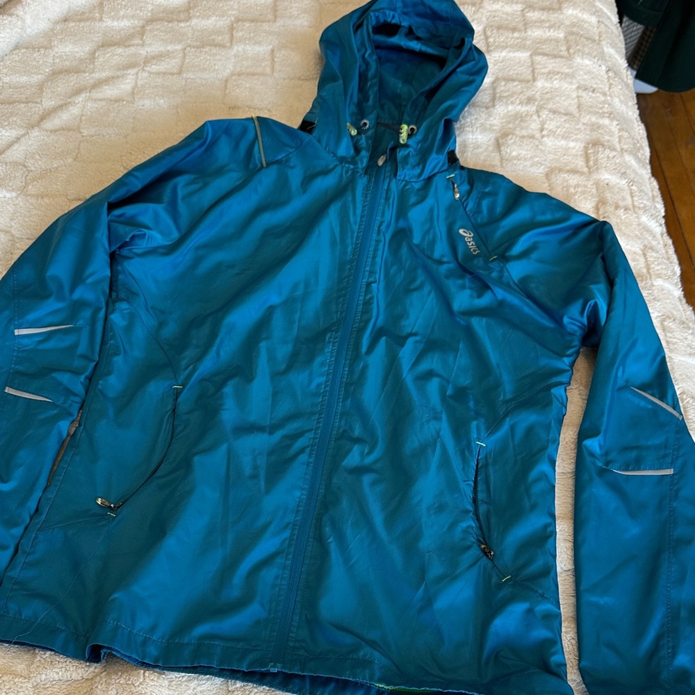 U—Asics Teal Windbreaker Jacket with light.